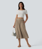 Jupe midi casual fluide croisée taille haute avec poches