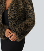 Manteau cape fausse fourrure col V manches longues