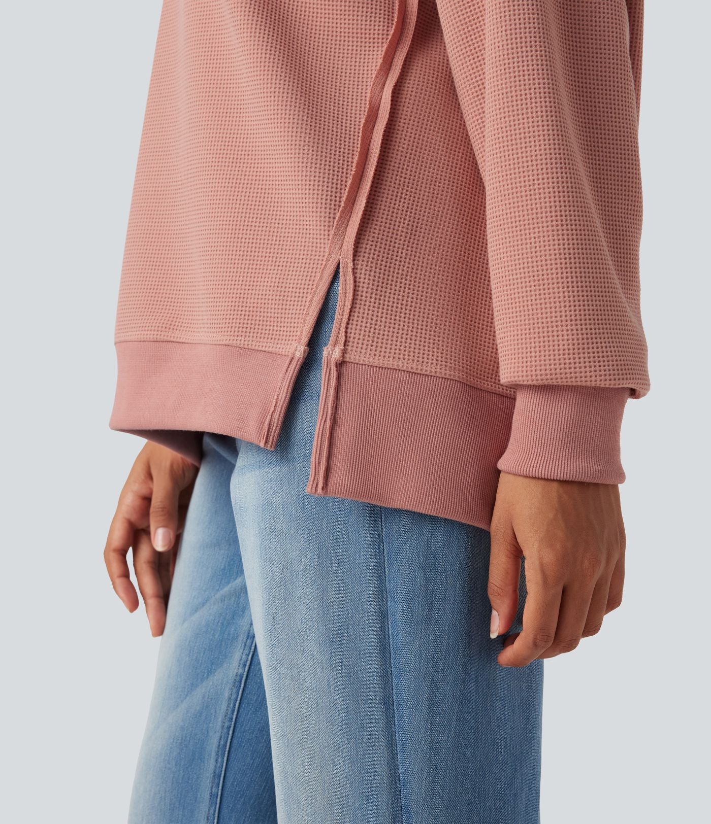 Sweat-shirt gaufré col rond ourlet fendu manches longues