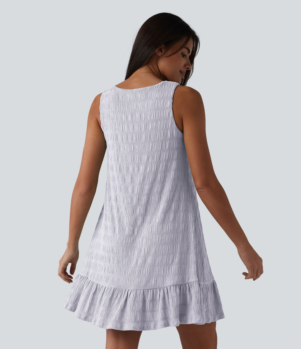 Robe courte décontractée sans manches à col rond, soutien-gorge intégré et ourlet à volants