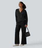 Blouse esprit bureau défroissage facile, col V, manches longues et boutons décoratifs