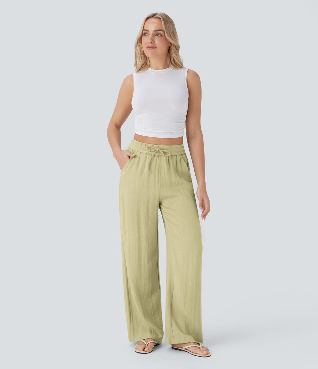 Pantalon large fluide taille haute avec cordon de serrage, poches latérales et aspect lin