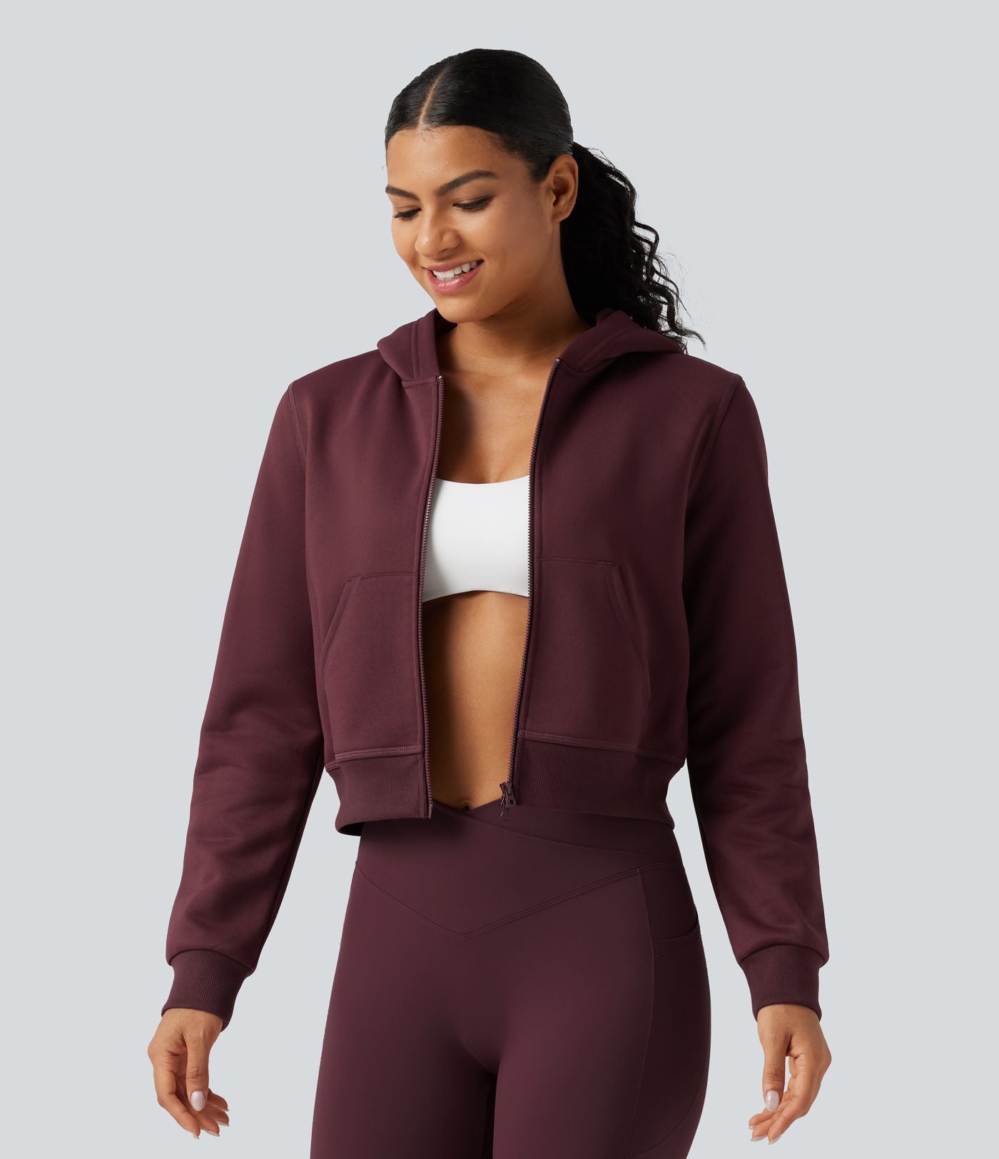 Veste de sport polaire à capuche, manches longues, zip et poches
