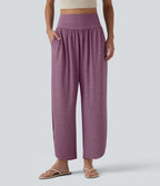 Pantalon décontracté taille haute gainant avec ourlet arrondi et poches