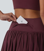 Jupe de danse mini 2-en-1 en mesh respirant à volants et ourlet asymétrique taille haute avec poches