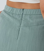 Jupe mini effet lin taille haute 2-en-1 avec poches