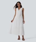 Robe mi-longue fluide col V sans manches avec nœud au dos