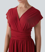 Robe longue de soirée col V, manches courtes, dos croisé à nouer, fendue avec poche latérale