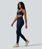 Brassière de sport SoftlyZero™ Plush à maintien léger, dos croisé ouvert, rayures color block et soutien intégré
