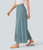 Pantalon fluide et ample avec superposition en mesh, poches latérales et taille haute