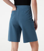 Short tailleur baggy taille haute avec boutons décoratifs et poches