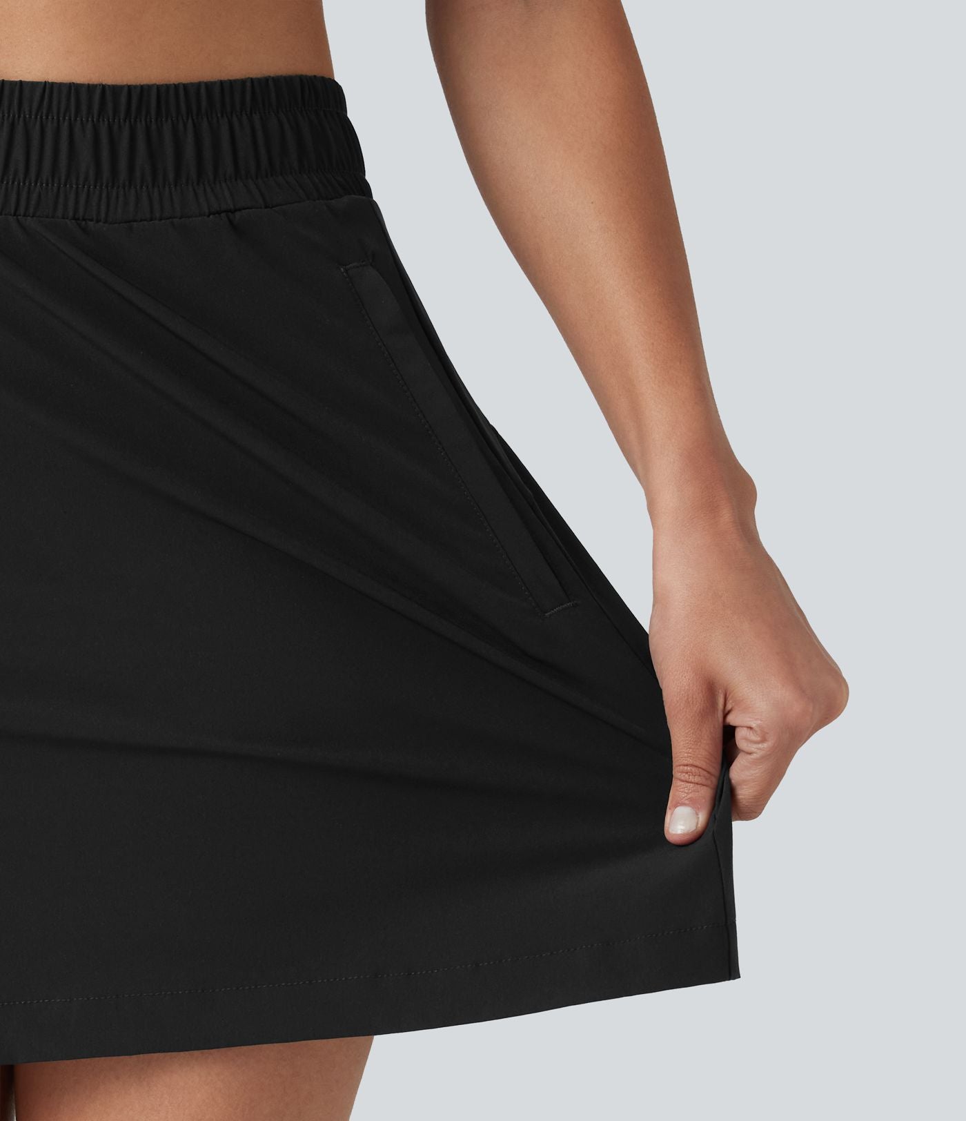 Jupe mini trapèze 2-en-1 taille haute avec boutons-pression et poches pour la randonnée