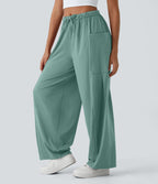 Pantalon Large Fluide Taille Mi-Haute Taille Élastique Cordon Poches Latérales Ourlet Flottant