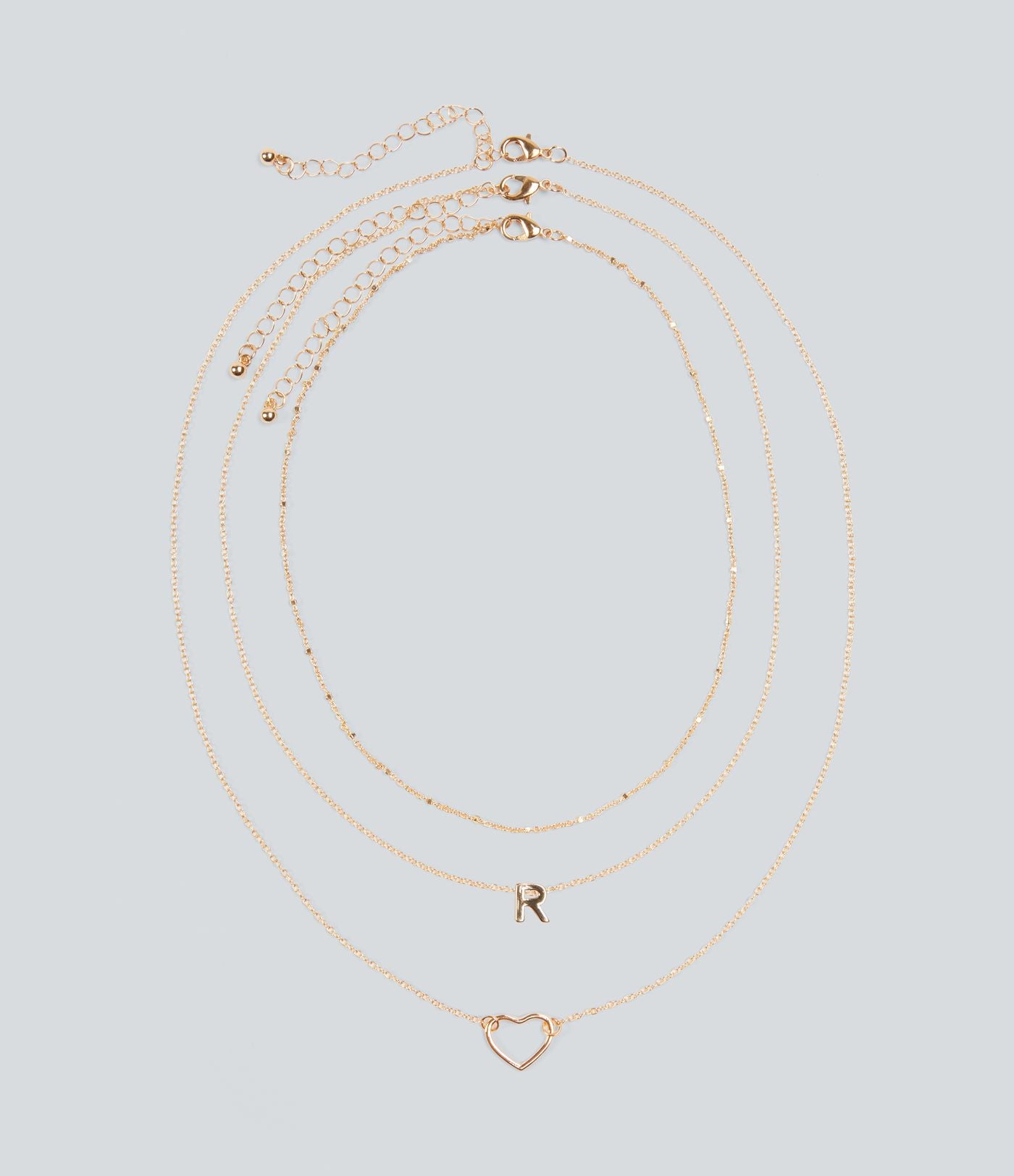 Ensemble de colliers pendentifs lettre + cœur