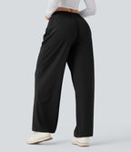 Pantalon de yoga tissu gaufré taille mi-haute jambe droite avec cordon de serrage et poches
