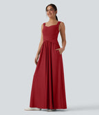 Robe maxi fluide dos nu, avec brassière intégrée et poches