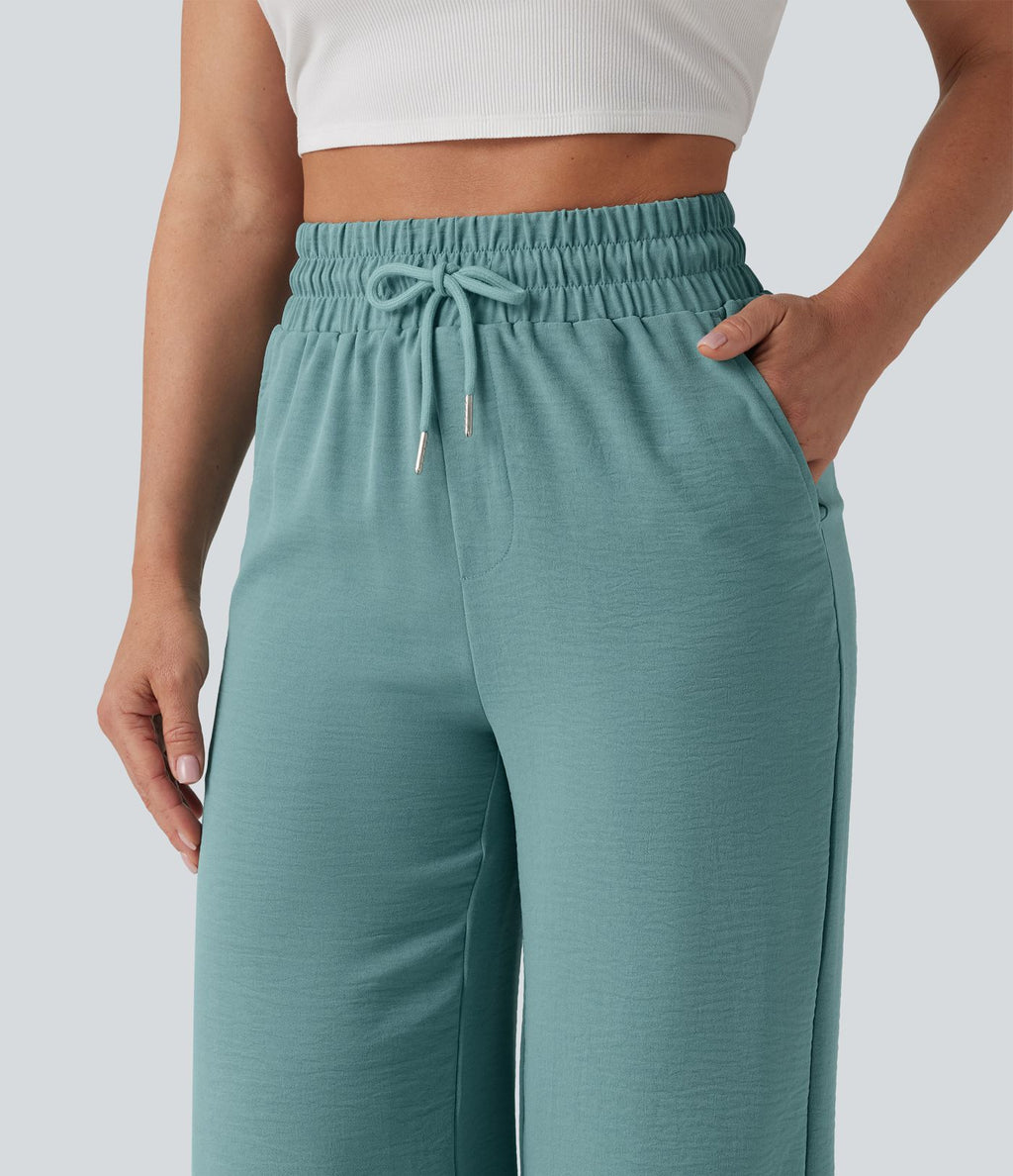 Pantalon casual 7/8 taille haute aspect lin à cordon de serrage et ourlet arrondi avec poches