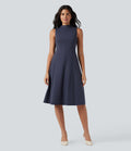 Robe mi-longue col montant sans manches avec poches