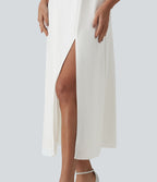 Robe de demoiselle d'honneur et d'invitée de mariage en mousseline fendue col Reine Anne manches bouffantes longueur midi