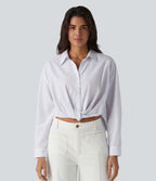 Chemise casual col manches retroussées torsadée asymétrique à rayures