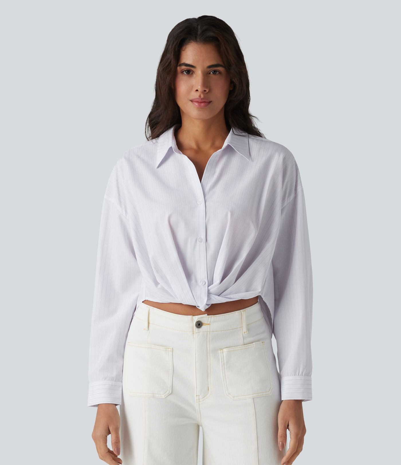 Chemise casual col manches retroussées torsadée asymétrique à rayures