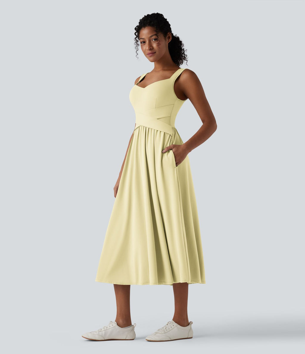 Robe midi fluide sans manches dos croisé ouvert avec poches
