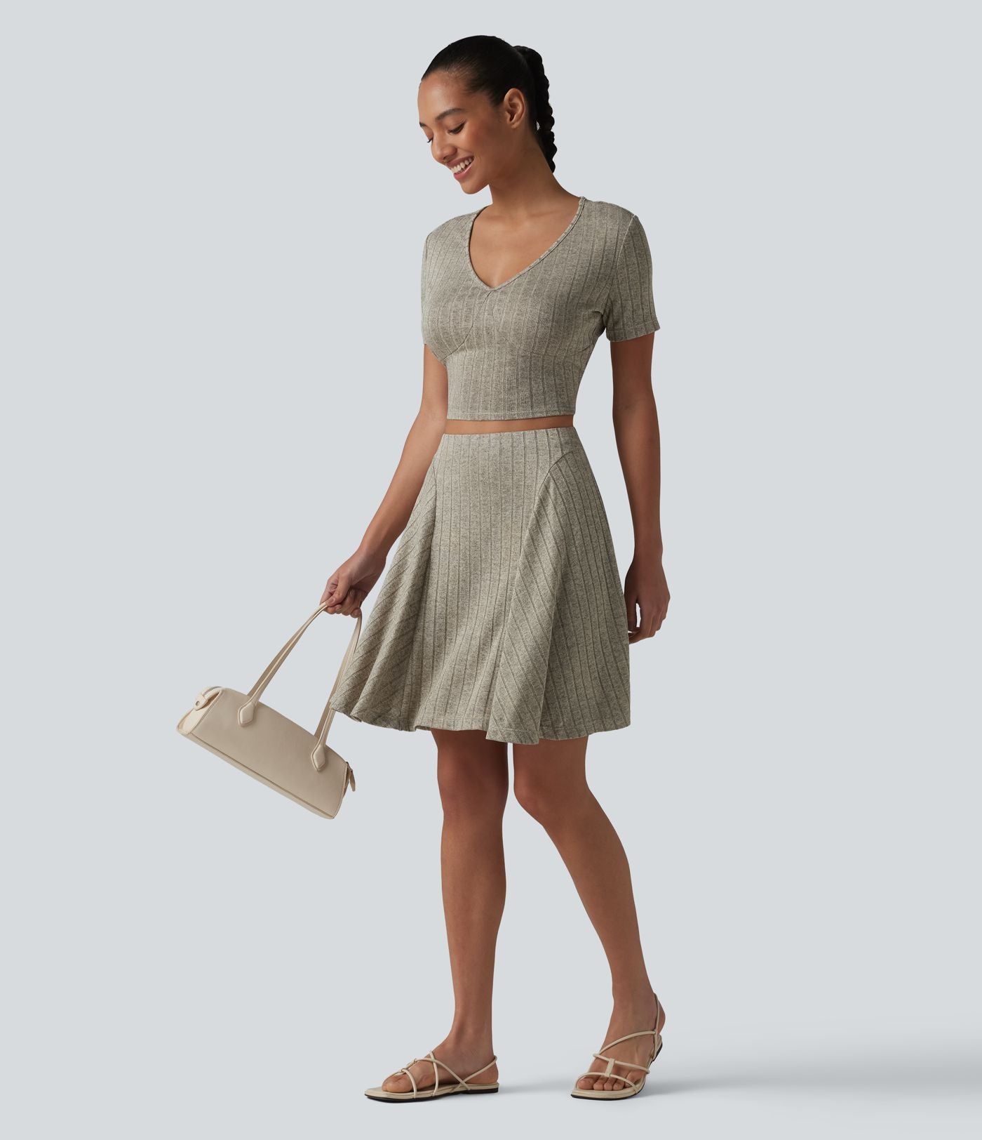 Jupe mini évasée casual 2 en 1 en maille côtelée taille haute avec poches