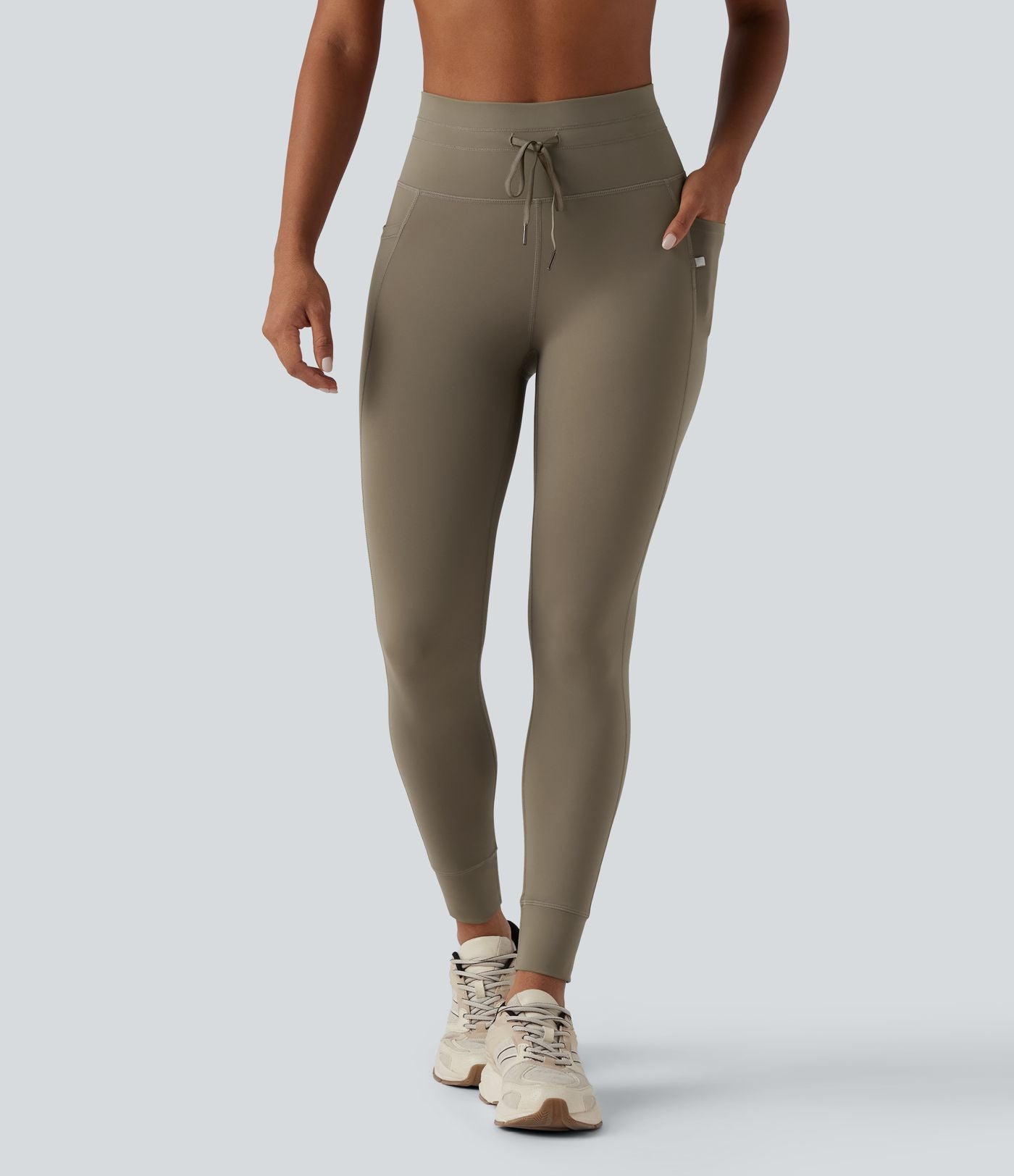 Legging 7/8 de yoga taille haute avec cordon de serrage uni et poches