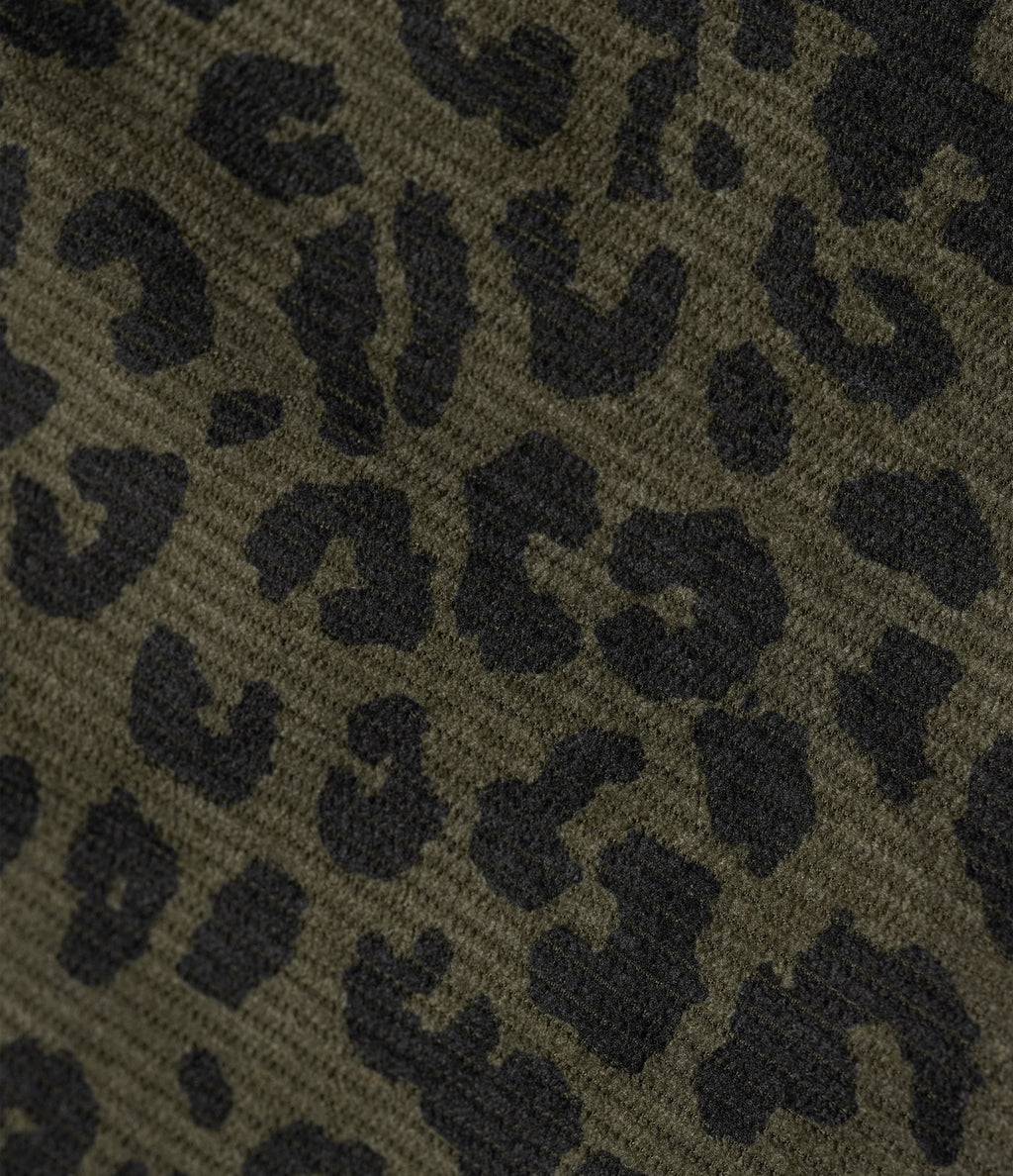 Jupe crayon mi-longue fendue velours côtelé imprimée léopard taille haute