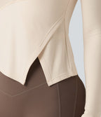 Halara HeatCore Haut de sport chauffant col rond manches longues ourlet asymétrique