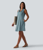 Robe de bureau mini en popeline stretch plissée col V sans manches avec fermeture éclair invisible et poches