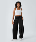 Pantalon Large Fluide Taille Mi-Haute Taille Élastique Cordon Poches Latérales Ourlet Flottant