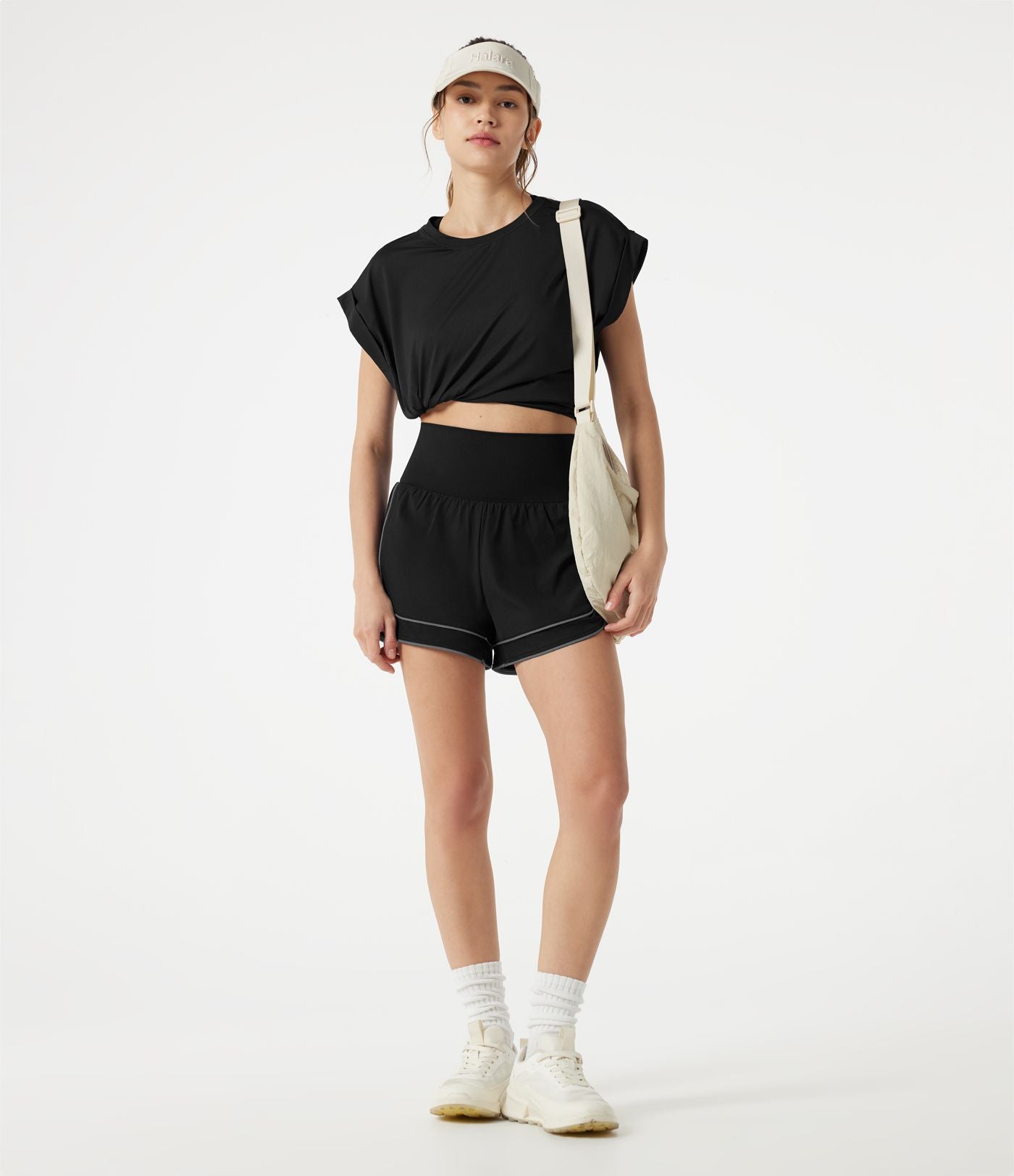 Short de yoga baggy 2-en-1 Breezeful™ taille haute à ourlet arrondi, séchage rapide, lignes réfléchissantes et poches