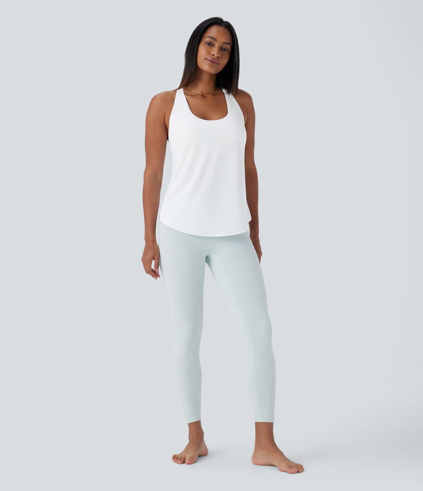 Débardeur yoga dos nu col U avec bretelles croisées, ourlet arrondi et effet frais InstantCool, protection solaire UPF50+