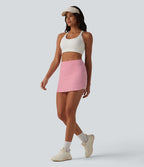 Jupe mini de tennis 2-en-1 à rayures taille haute avec ourlet arrondi et poches