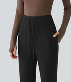 Pantalon large fluide côtelé taille haute avec cordon de serrage et poches