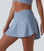 Jupe mini de tennis à œillets, taille haute, 2 en 1, coupe trapèze, croisée, avec poches