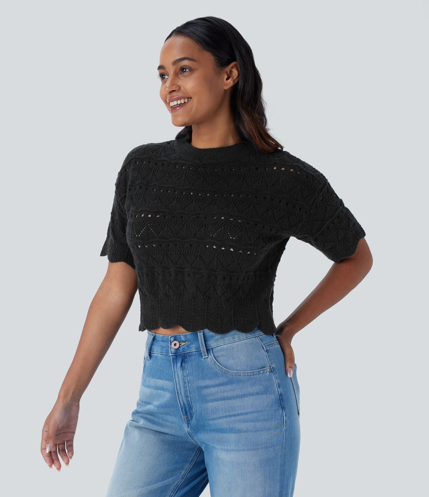 Pull décontracté en maille ajourée à col rond, manches courtes et bordure festonnée