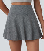 Jupe de sport mini gainante 2-en-1 taille haute à rayures avec poches