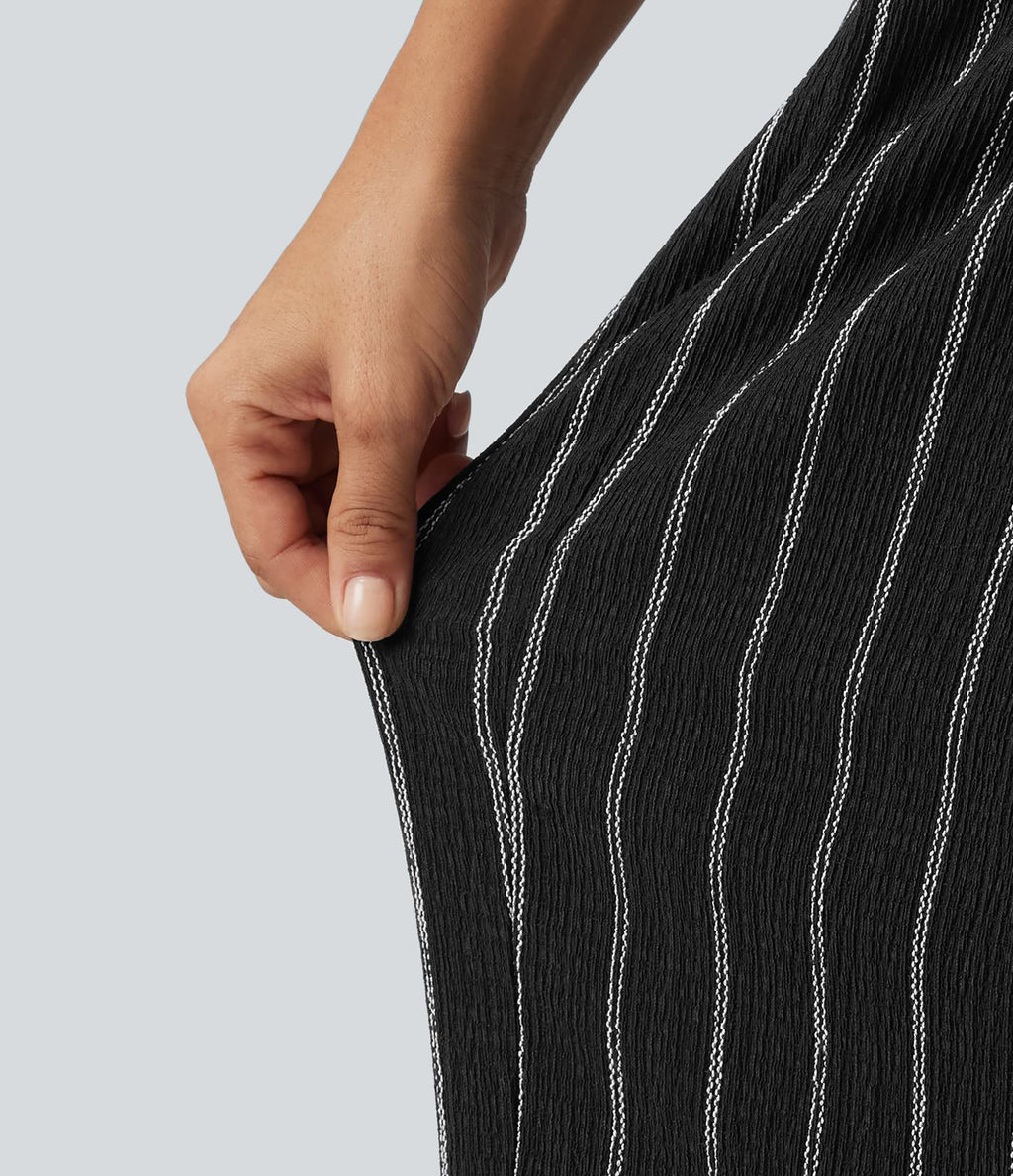 Pantalon rayé taille haute avec ourlet arrondi et poches