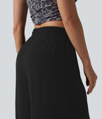 Pantalon ample décontracté à taille mi-haute, fentes, aspect lin, cordon de serrage et poches