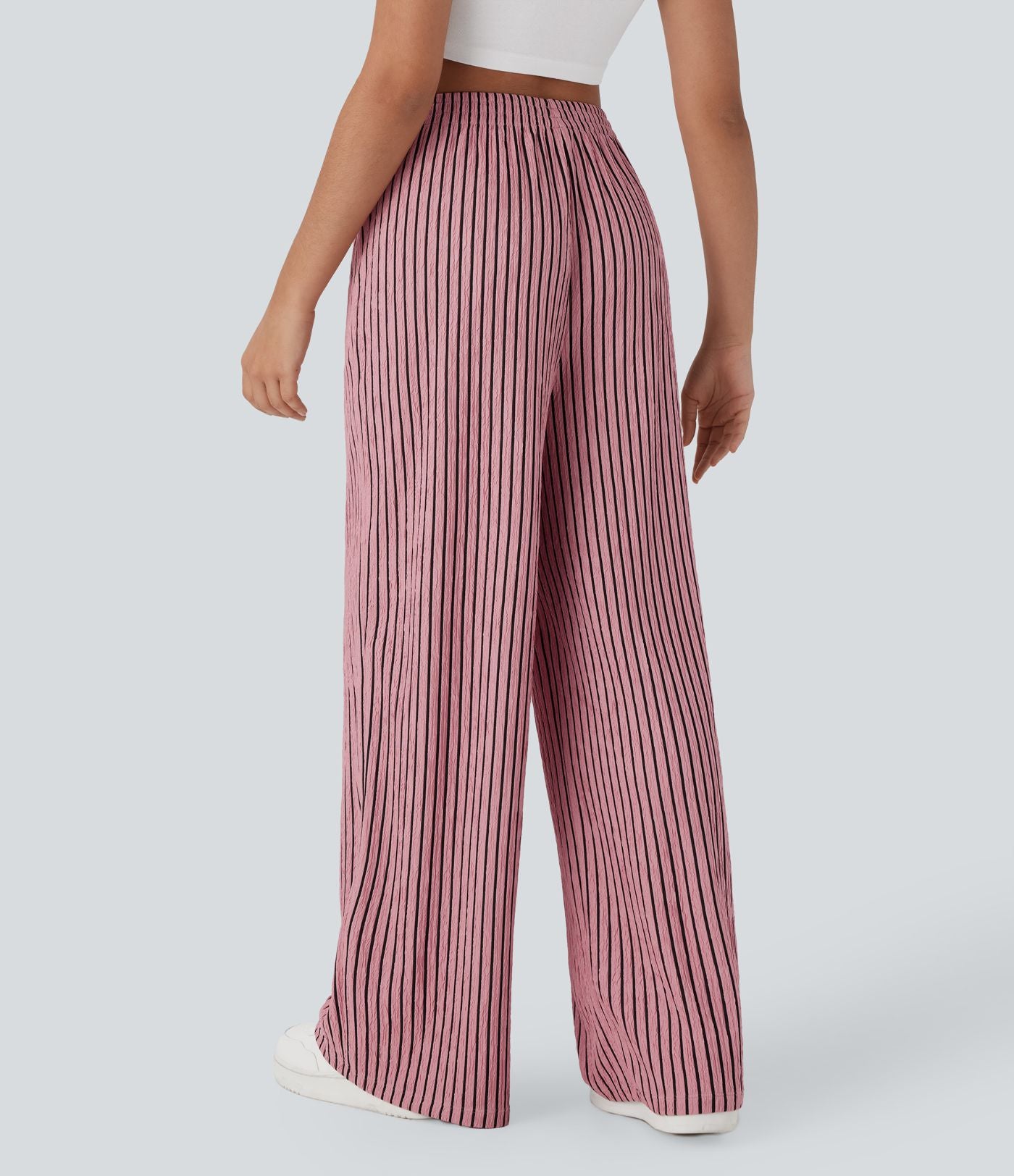 Pantalon tailleur décontracté à taille haute, jambes droites, texture froissée et poches latérales