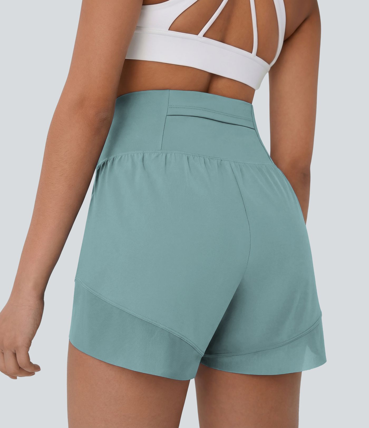 Breezeful™ Short yoga taille haute avec poche arrière ourlet croisé séchage rapide
