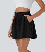 Short large décontracté taille haute façon paperbag avec cordon, poches latérales et aspect lin