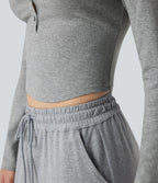 Haut détente cropped maille côtelée col henley manches longues