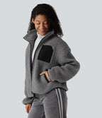 Veste sherpa col roulé manches longues avec poches