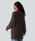 Pull décontracté à décolleté en V, manches longues et ourlet asymétrique