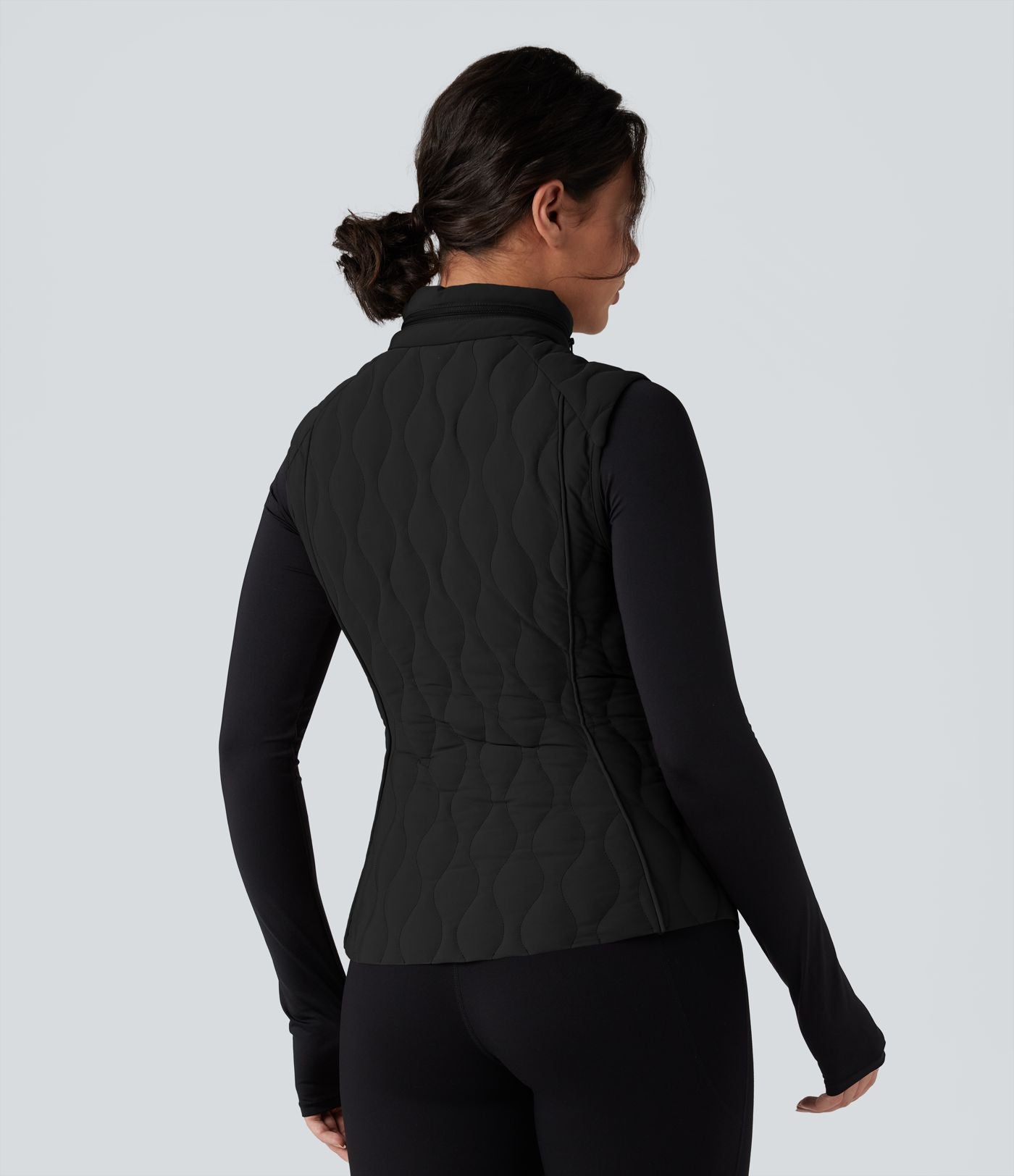 Gilet matelassé running PuffFlex col montant avec zip pliable avec poches