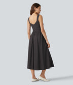 Robe fluide décontractée midi sans manches dos nu croisée à pois avec poches