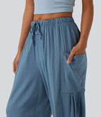 Pantalon court décontracté taille haute avec cordon de serrage, ourlet arrondi, effet lin et poches